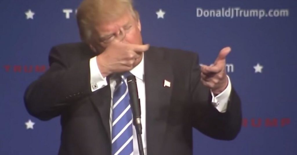 Trump miming shooting an immigrant at the border