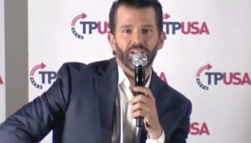 Don Jr holding a microphone