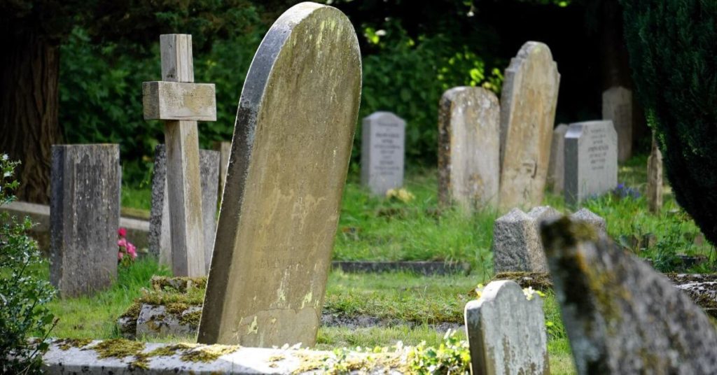 A photograph of tombstones in a graveyard.