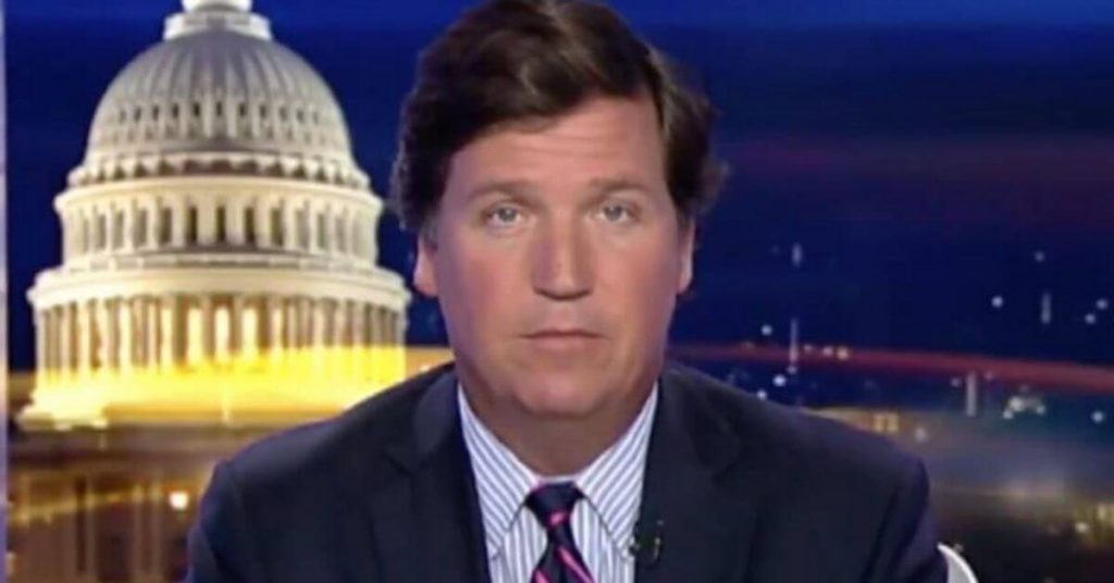 A screenshot of Tucker Carlson from his Fox News show