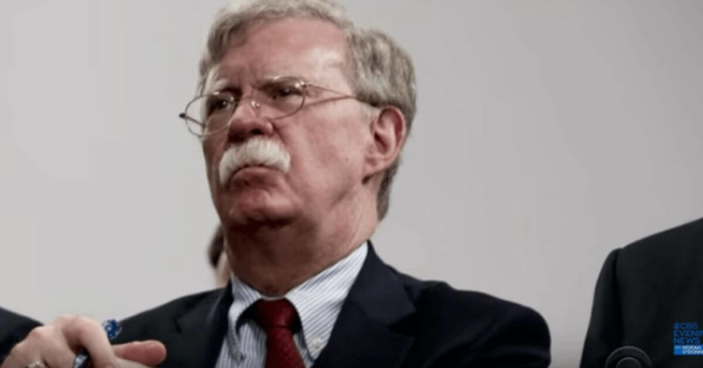 John Bolton looking to the left