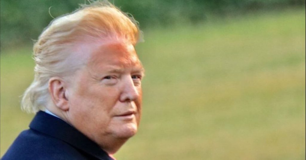 Trump with dark orange makeup on that isn't blended correctly