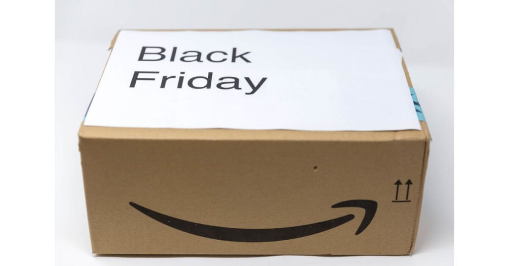 Amazon box with a sign on top that says Black Friday