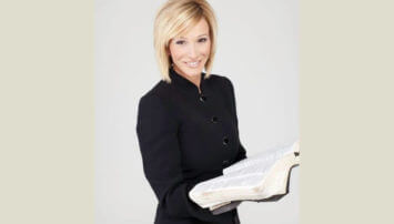 Paula White holding a bible