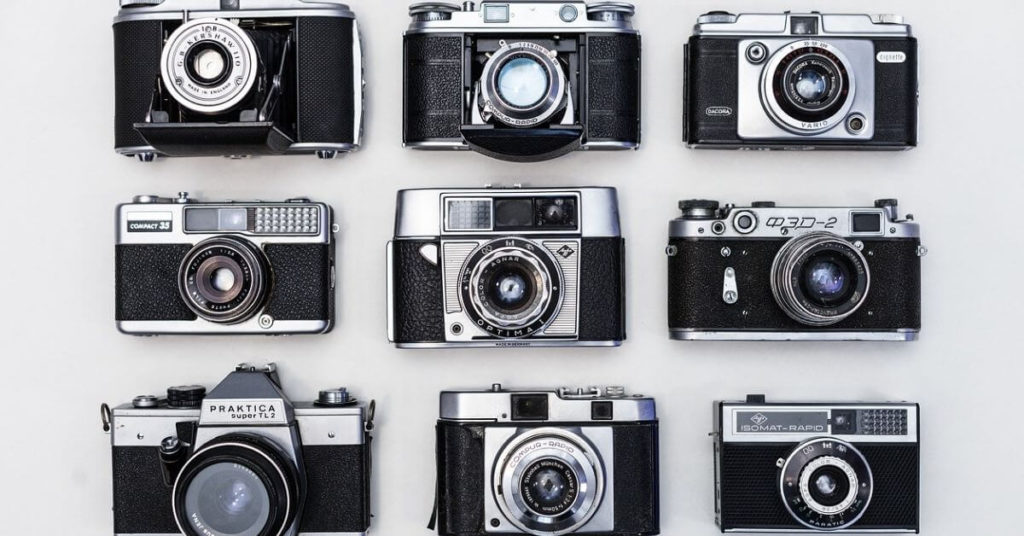 Multiple vintage cameras