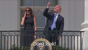 Trump looking at the eclipse without glasses