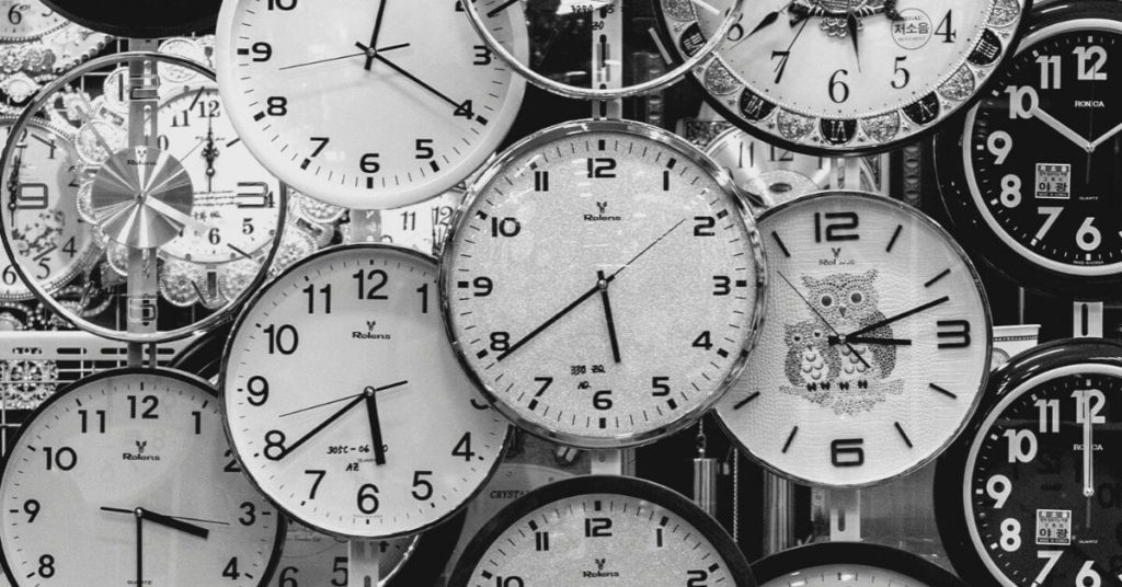 Flatlay photo of numerous clocks