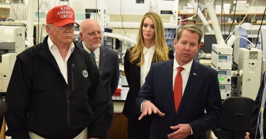 Loefflerstanding with Trump and others