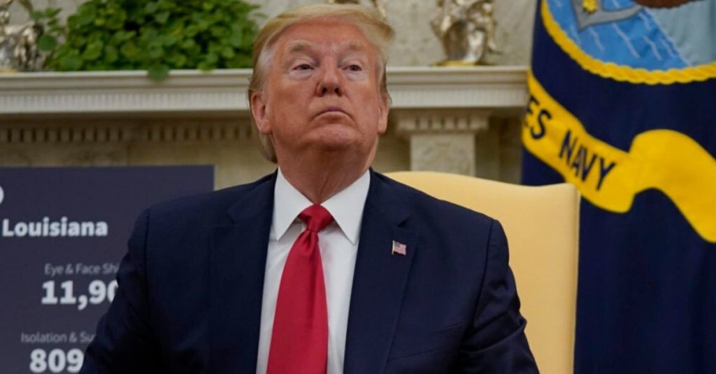 President Trump sitting in a yellow chair