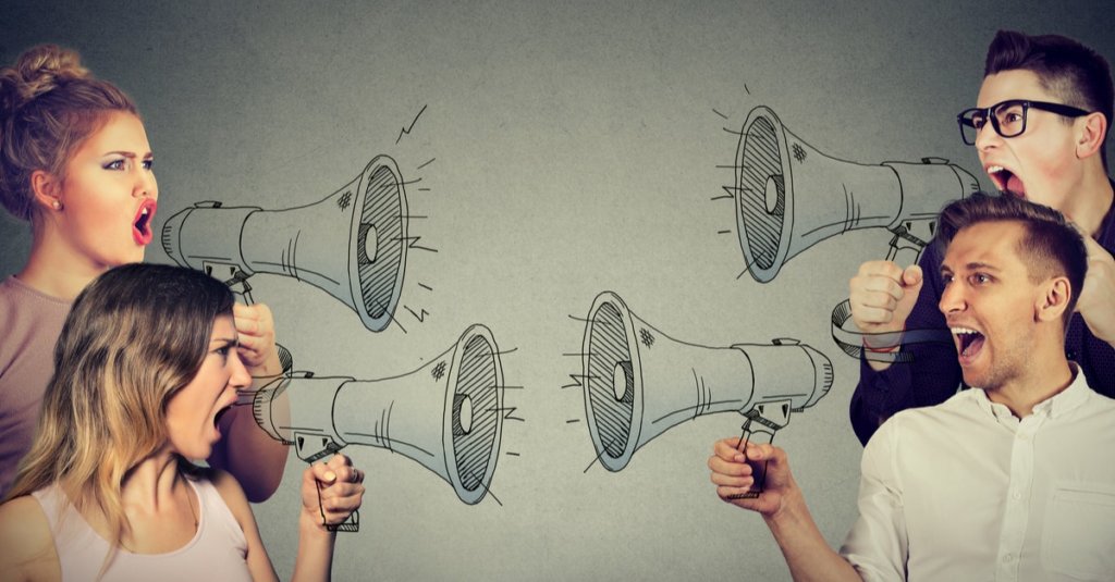 A stylized photograph of people yelling at each other through megaphones drawn on the image.