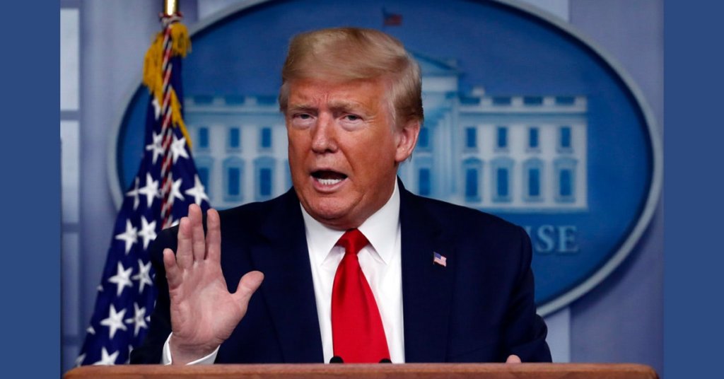 Donald Trump holding up his hand