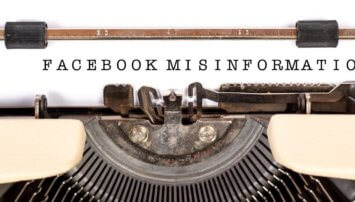 Typewriter with Facebook misinformation written on the paper