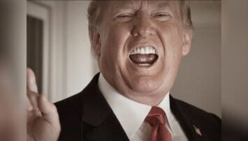 Trump screams at the camera.