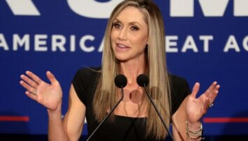 Lara Trump standing at a podium