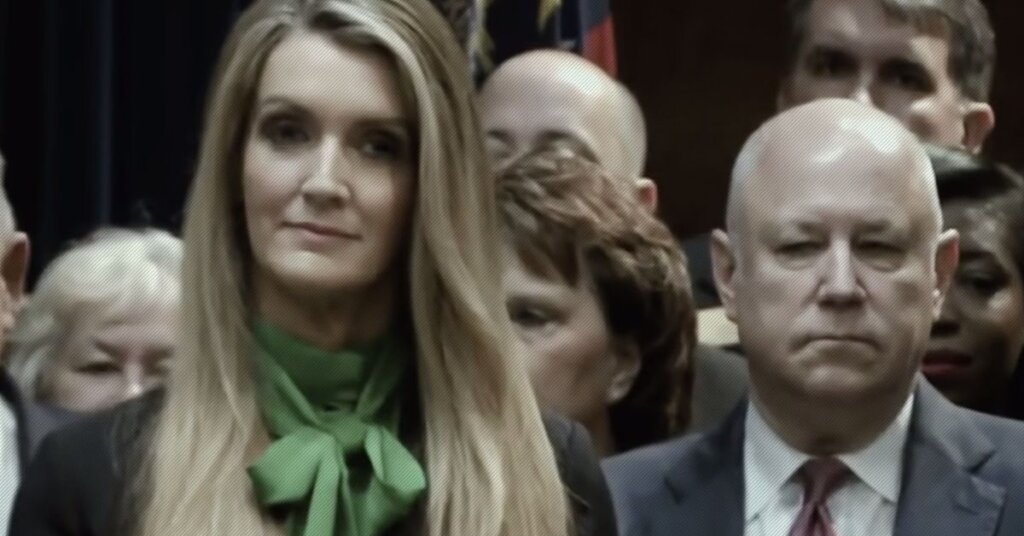 Kelly Loeffler standing in a crowd