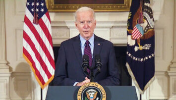 Biden standing at a podium