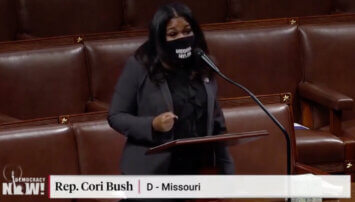 Rep. Cori Bush speaking at a podium